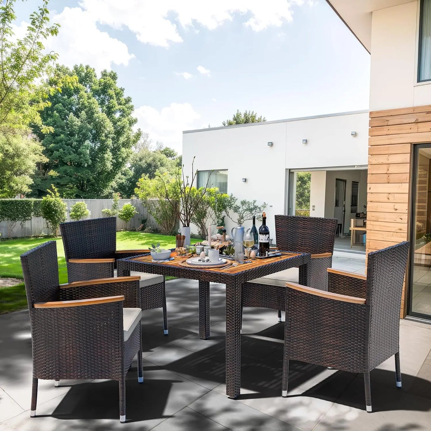 Five Piece Patio Dining Set With Wicker Chairs And Tabletop